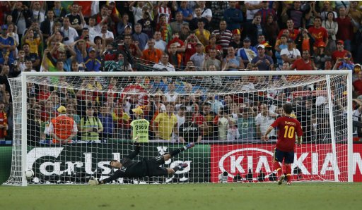 Spain's Fabregas scores a decisive penalty during penalty shoot-out of the Euro 2012 semi-final soccer match against Portugal at Donbass Arena in Donetsk