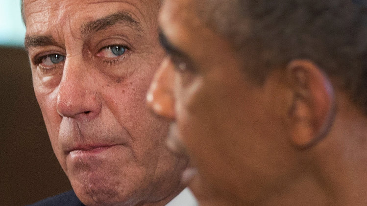 House Speaker John Boehner of Ohio listens as President Barack Obama speaks to media, in the Cabinet Room of the White House in Washington, Tuesday, Sept. 3, 2013, before a meeting with between the president and Congressional leaders to discuss the situation in Syria. Boehner said he will support the president's call for the U.S. to take action against Syria for alleged chemical weapons use and says his Republican colleagues should support the president, too. (AP Photo/Carolyn Kaster)