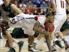 Louisville forward Chane Behanan, center, grabs a loose ball in front of Colorado State forward Pierce Hornung (4) in the first half of a third-round NCAA college basketball tournament game on Saturday, March 23, 2013, in Lexington, Ky.  (AP Photo/John Bazemore)