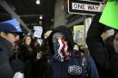 Protesters gather outside Terminal 4 at JFK airport in opposition to U.S. president Donald Trump's proposed ban on immigration in Queens, New York City, U.S.
