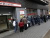 People line up to enter a government employment benefit office in Madrid, Spain, Friday, April 27, 2012. Spain's economic problems were put in sharp relief as Official figures showed that unemployment has spiked to 24.4 percent in the first quarter of 2012, the highest rate in the 17-country eurozone, from 22.9 percent in the fourth quarter of 2011. 365,900 people lost their jobs in the first three months of the year, taking the total unemployed to 5.6 million. (AP Photo/Alberto Di Lolli)