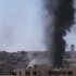 This image made from amateur video released by the Ugarit News and accessed Tuesday, June 19, 2012, purports to show black smoke rising from buildings in Rastan town, Homs, Syria. Syria's government said Tuesday it was ready to act on a U.N. call to evacuate civilians trapped in the rebellious central city of Homs for more than a week, but blamed rebels for obstructing efforts to get them out. (AP Photo/Ugarit News via AP video) TV OUT, THE ASSOCIATED PRESS CANNOT INDEPENDENTLY VERIFY THE CONTENT, DATE, LOCATION OR AUTHENTICITY OF THIS MATERIAL