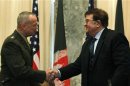 Afghan Defence Minister Wardak and NATO's top commander of foreign troops in Afghanistan, U.S. Marine General Allen, shake hands after signing agreement in Kabul