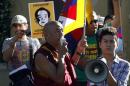 Tibetan monk Thubten Wangchen takes part in a protest calling for the release of Gedhun Choekyi Nyima, the 11th Panchen Lama, in Barcelona
