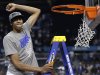 Kentucky forward Anthony Davis celebrates as he cuts the net after the NCAA Final Four tournament college basketball championship game Monday, April 2, 2012, in New Orleans.  Kentucky beat Kansas 67-59.  (AP Photo/David J. Phillip)
