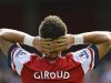 Arsenal's Giroud reacts following missed goal-scoring opportunity during their English Premier League soccer match against Sunderland in London
