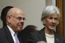 U.S. Health and Human Services Secretary Sebelius is greeted by Rep Waxman before testifying on Capitol Hill in Washington