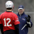 FILE - In this Dec. 14, 2011, file photo, New England Patriots offensive coordinator/quarterbacks coach Bill O'Brien talks with quarterback Tom Brady (12) during NFL football practice in Foxborough, Mass. O'Brien's agent said he was interviewing Thursday, Jan. 5, 2012, for the vacant Penn State head-coaching position. (AP Photo/Stephan Savoia, File)