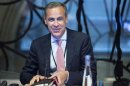 Mark Carney, the governor of the Bank of England, attends a monetary policy committee briefing on his first day at the central bank's headquarters in London