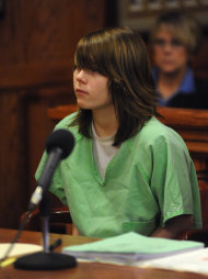 FILE - In this Dec. 8, 2009 file photo, Alyssa Bustamante, 15, listens during a brief hearing where her attorney entered not guilty pleas on her behalf to charges of armed criminal action and first-degree murder in Cole County Circuit Court in Jefferson City, Mo. Bustamante, who admitted stabbing, strangling and slitting the throat of a young neighbor girl, wrote in her journal on the night of the killing that it was an "ahmazing" and "pretty enjoyable" experience — then headed off to church with a laugh. The words written by Bustamante were read aloud in court Monday, Feb. 6, 2012, as part of a sentencing hearing to determine whether she should get life in prison or something less for the October 2009 murder of her neighbor, 9-year-old Elizabeth Olten, in a small town west of Jefferson City. (AP Photo/Kelley McCall, Pool, File)