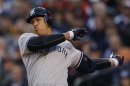 New York Yankees Alex Rodriguez swings through a pitch during the sixth inning of Game 4 of their MLB ALCS baseball playoff series against the Detroit Tigers in Detroit
