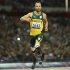 Pistorius of South Africa wins his men's 200m T44 classification heat in a new world record time at the Olympic Stadium during the London 2012 Paralympic Games