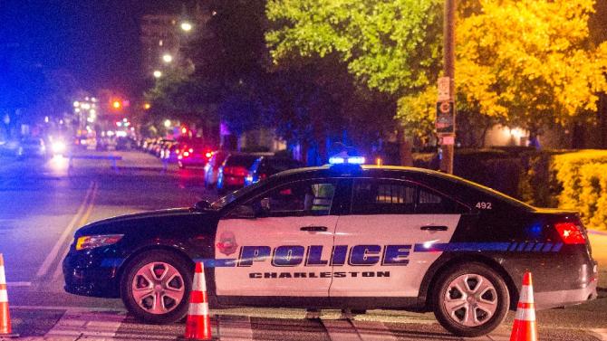 Gunman on run after nine killed in Charleston church shooting.