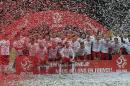 Poland's team celebrate after they won the Euro 2016 Group D qualifying soccer match between Poland and The Republic of Ireland at the National Stadium in Warsaw, Poland, Sunday, Oct. 11, 2015.(AP Photo/Czarek Sokolowski)