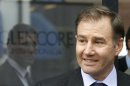 Glencore CEO Glasenberg smiles as he leaves after the company's annual shareholder meeting in Zug