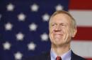 Republican Bruce Rauner smiles after winning the midterm elections in Chicago, Illinois