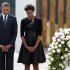 President Barack Obama and first lady Michelle Obama pause for a moment of silence at the wreath laying ceremony at the Flight 93 National Memorial Sunday, Sept., 11, 2011 in Shanksville, Pa., on the 10th anniversary of the Sept. 11 attacks.  (AP Photo/Pablo Martinez Monsivais)