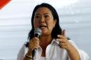 Fujimori gives a speech during a meeting with local leaders in San Juan de Lurigancho in Lima