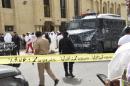 Police cordon off the Imam Sadiq Mosque after a bomb explosion following Friday prayers, in the Al Sawaber area of Kuwait City