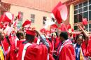 Graduating students of the American University of Nigeria in Yola celebrate after their commencement ceremony at the school on May 9, 2015