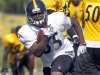 In this photo from Sunday, July 31, 2011, Pittsburgh Steelers running back Baron Batch (35) runs the ball during training camp at the NFL football team's practice facility in Latrobe, Pa. Steelers' veteran running back Mewelde Moore and rookies Baron Batch and John Clay are fighting for playing time behind starter Rashard Mendenhall. (AP Photo/Keith Srakocic)