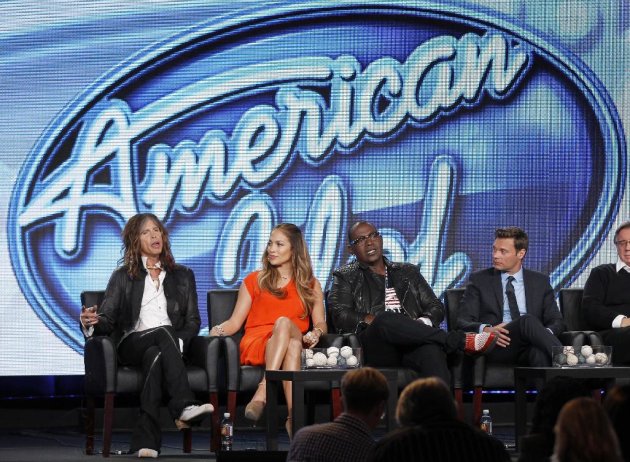 From left to right, Steven Tyler, Jennifer Lopez, Randy Jackson and Ryan Seacrest participate in the American Idol panel at the Fox Broadcasting Company Television Critics Association Winter Press Tour in Pasadena , Calif. on Sunday, Jan. 8, 2012. (AP Photo/Danny Moloshok)