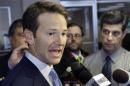 FILE - In this Feb. 6, 2015, file photo, Rep. Aaron Schock, R-Ill. speaks to reporters in Peoria Ill. According to a source, the Justice Department is investigating possible criminal violations by resigning Illinois congressman. (AP Photo/Seth Perlman, File)