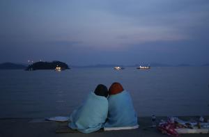 Relatives of passengers aboard the sunken ferry Sewol &hellip;
