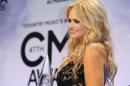 Miranda Lambert poses backstage with her Female Vocalist of the Year award at the 47th Country Music Association Awards in Nashville