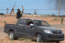 Forces loyal to Libyan unity government celebrate the recapture Abu Grain, one of the main checkpoints south of the city of Misrata