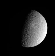 This photo made March 10, 2012, by NASA's Cassini spacecraft shows a raw, unprocessed image of Saturn's moon Rhea. The camera was pointing toward Rhea from a distance of approximately 42,096 kilometers (26,157 miles). (AP Photo/NASA/JPL-Caltech/SSI)