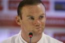England national soccer team player Wayne Rooney attends a press conference after a squad training session for the 2014 soccer World Cup at the Urca military base in Rio de Janeiro, Brazil, Saturday, June 21, 2014. Costa Rica's surprise 1-0 win over Italy on Friday meant that England made its most humiliating exit from a World Cup since 1958, following consecutive defeats by the Italians and then Uruguay in Group D. England play Costa Rica in their final Group D match on Tuesday. (AP Photo/Matt Dunham)