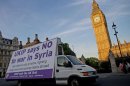 A UK Independence Party van drives past the Houses of Parliament in London on August 29, 2013