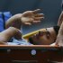 Manchester City's Aguero waves to supporters as he is stretchered off the pitch during their English Premier League soccer match against Southampton in Manchester