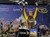 Kyle Busch celebrates winning the NASCAR Sprint Cup Series auto race at Richmond International Raceway in Richmond, Va., Saturday, April 28, 2012. (AP Photo/Clemment Britt)