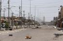 A view of a street is seen in Falluja, Iraq, after government forces recaptured the city from Islamic State militants