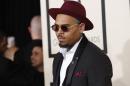 Singer Chris Brown arrives at the 57th annual Grammy Awards in Los Angeles