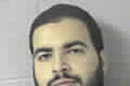 FILE - This Oct. 21, 2009, file booking photo provided by the Sudbury, Mass., Police Dept. shows Tarek Mehanna, of Sudbury, who was convicted of conspiring to help al-Qaida. Mehanna is scheduled to be sentenced on Thursday, April 12, 2012, after being convicted in December of four terror-related charges and three charges of lying to authorities. (AP Photo/Sudbury Police Department, File)