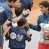 Nadal of Spain shakes hands with ball boys after defeating compatriot Ferrer in their men's singles final match to win the French Open tennis tournament in Paris