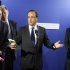 French President Francois Hollande, center, delivers his speech as he visits the Secours Catholique charity organisation center in Colombes, West of Paris, Friday July 13, 2012.(AP Photo/Pool/Remy de la Mauviniere)