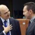 French Finance Minister Pierre Moscovici, left, speaks with Greek Finance Minister Yannis Stournaras during a meeting of eurogroup finance ministers in Brussels on Tuesday, Nov. 20, 2012. European Union officials will make a fresh try Tuesday to reaching a political accord on desperately needed bailout loans to Greece, an agreement that eluded them last week. (AP Photo/Thierry Charlier)