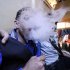 In this picture taken on Wednesday, March 7, 2012, Iraqis who identify themselves as so-called Emos smoke a traditional "shisha" water pipe, as its smoke obscures their identity, in the Shiite holy city of Najaf, 160 kilometers (100 miles) south of Baghdad, Iraq. Young people who identify themselves as so-called Emos are being brutally killed at an alarming rate in Iraq, where militias have distributed hit lists of victims and security forces say they are unable to stop crimes against the subculture that is widely perceived in Iraq as being gay. Officials and human rights groups estimated as many as 58 Iraqis who are either gay or believed to be gay have been killed in the last six weeks alone _ forecasting what experts fear is a return to the rampant hate crimes against homosexuals in 2009. (AP Photo/Alaa al-Marjani)