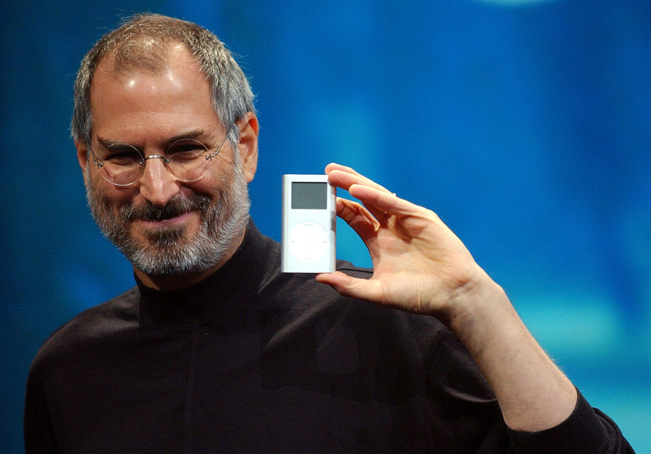 2004 - Apple CEO Steve Jobs displays the iPod mini at the Macworld Conference and Expo in San Francisco. Jobs, the Apple founder and former CEO
 who invented and masterfully marketed ever-sleeker gadge