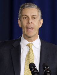 FILE - In this Jan. 12, 2012 file photo, Education Secretary Arne Duncan speaks in Gahanna, Ohio. Hardbound textbooks may be going the way of slide rules and typewriters in schools. Education Secretary Arne Duncan and FCC Chairman Julius Genachowski are challenging schools and companies to get digital textbooks in students' hands within five years. (AP Photo/Jay LaPrete, File)