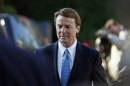 Former U.S. Sen. and presidential candidate John Edwards arrives at federal court in Greensboro, N.C., Monday, April 23, 2012. Prosecutors and defense lawyers will begin making their case to jurors on whether the former presidential candidate violated federal campaign finance laws. (AP Photo/Gerry Broome)
