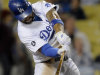 Los Angeles Dodgers' Matt Kemp hits a single to center field in the sixth inning of a baseball game against the Pittsburgh Pirates, Saturday, Sept. 17, 2011, in Los Angeles. (AP Photo/Gus Ruelas)