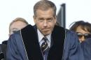 NBC News anchor Brian Williams prepares to receive an honorary doctorate in humane letters from George Washington Universityl in Washington