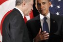 U.S. President Barack Obama, right, talks with Prime Minister of Turkey Recep Tayyip Erdogan during their bilateral meeting in Seoul, South Korea, Sunday, March, 25, 2012. (AP Photo/Pablo Martinez Monsivais)