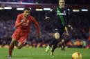 Liverpool's midfielder Jordon Ibe (L) chases the ball during the English League Cup semi-final second leg football match between Liverpool and Stoke City at Anfield in Liverpool, England, on January 26, 2016