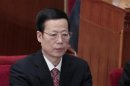 China's Tianjin Municipality Communist Party Secretary Zhang Gaoli attends the closing ceremony of the NPC in Beijing